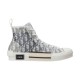 Full side profile studio shot of Dior B23 high-top white trainer