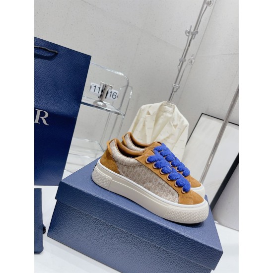 Dior B33 Oblique Low-Top Trainers on Box in brown and cream Dior B33 brown suede and oblique jacquard trainers sitting on a blue shoe box in brown and cream