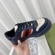 Gucci Dark Blue Trainers Handheld View Handheld view showcasing the front toe box and lace closure design in dark blue