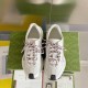 Gucci Run Leather Trainers In White Top View in white and red Gucci Run Leather Trainers In White top-down pair view showing patterned laces and dark toe cap detail in white and red