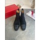 Christian Louboutin Men's Black Studded Suede Chelsea Boots Front View Front view of Christian Louboutin Men's Black Studded Suede Chelsea Boots showing studded toe detail