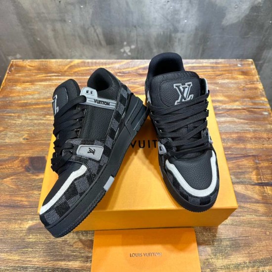 Angled pair display highlighting black and grey uppers of L Trainer Damier Denim Black Low Top Sneakers