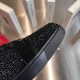 Christian Louboutin Black Crystal Toe Cap Detail Close-up view of crystal embellished toe cap and black rubber sole