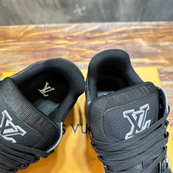 Top-down view of black padded collars and branded tongues on L Trainer Damier Denim Black Low Top Sneakers in black and grey