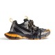 Full lateral side view of Balenciaga 3XL trainer in black and orange colourway
