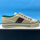 Gucci Off The Grid Canvas Low Top Trainer Side Detail in beige and green Side profile of Gucci Off The Grid Canvas Low Top Trainer in beige with green trim