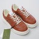 Pair of Gucci brown jumbo GG embossed trainers viewed from above