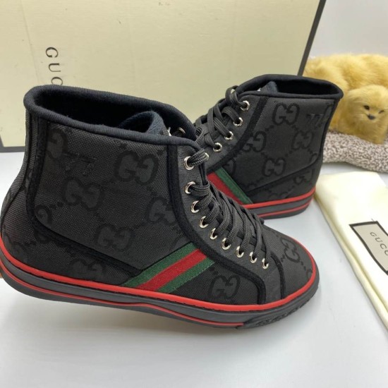 Gucci Off The Grid High Top Trainers Angled View in black and red Angled view of Gucci high top trainers in black canvas featuring GG monogram and red trim