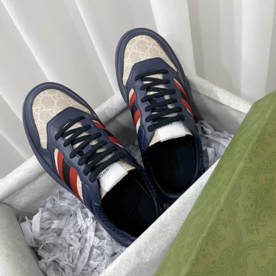 Gucci Dark Blue Trainers Top View Top-down view of dark blue lace-up trainers with monogram canvas toe panels