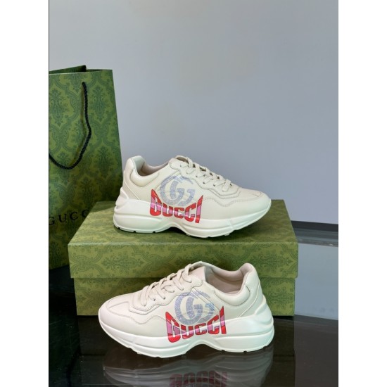 Gucci Ivory Leather Double G Chunky Trainers pair side arrangement