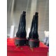 Christian Louboutin Men's Black Leather Chelsea Boots Back View Rear view of Christian Louboutin Men's Black Leather Lug Sole Chelsea Boots displaying back seams and heel base.