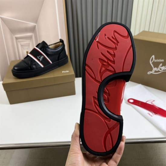 Bottom outsole view of Christian Louboutin Adolescenza trainer showing signature bright red rubber sole in black and red