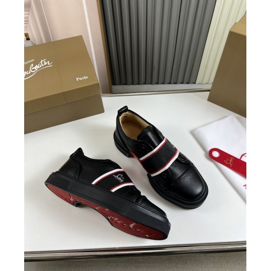 Angled pair view showing black leather upper and red underside of Christian Louboutin Adolescenza Trainers