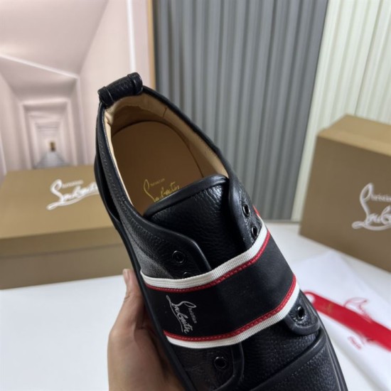 Top-down view inside Christian Louboutin Adolescenza black trainer showing branded inner lining in black and red