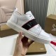 Hand holding Christian Louboutin Adolescenza White Leather Trainer
