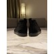 Back view of both Christian Louboutin black embellished high top trainers