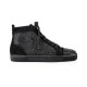 Studio shot of Christian Louboutin black crystal embellished high top trainer