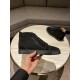 Lateral side of Christian Louboutin black crystal embellished high top trainer