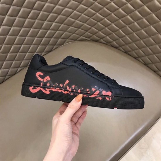 Christian Louboutin Black Trainer Graphic Side Detail in black and red Lateral side view of Christian Louboutin black trainer with red graphic text