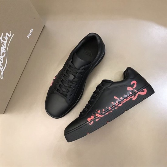 Christian Louboutin Black Low Top Trainers Angled View in black and red Angled top view of pair of Christian Louboutin black trainers in black and red