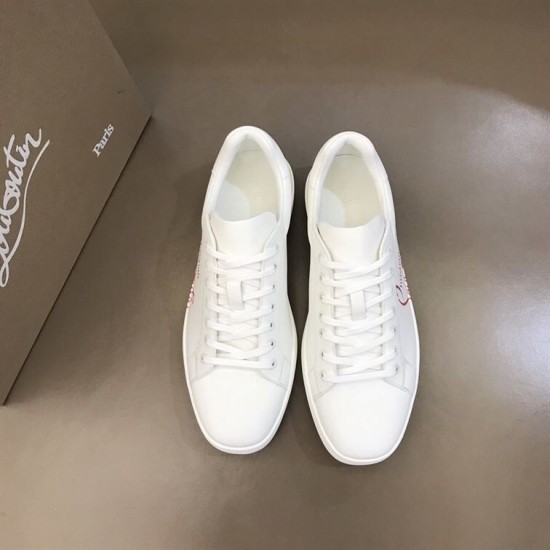 Top-down view of pair of Christian Louboutin white leather script logo low top trainers in white and red