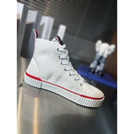 Christian Louboutin White Trainer Perspective Angle Christian Louboutin white canvas high top trainer lateral perspective