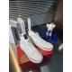Christian Louboutin White Canvas Trainers Pair View Pair of Christian Louboutin white canvas high top trainers on box