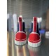 Rear heel view of Christian Louboutin Pedro Junior High-Top Canvas Trainers showing red panels in navy and red