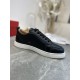 Christian Louboutin Rantulow black trainer lateral side view showing side eyelets