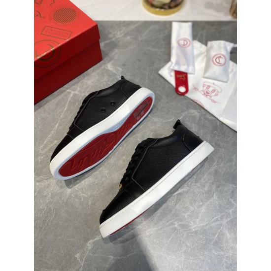 Christian Louboutin Rantulow trainers showing the signature red outsole and black textured upper