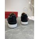 Rear view of heel tabs and textured black leather back on Christian Louboutin Rantulow trainers