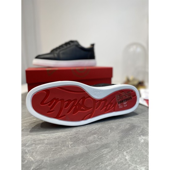 Underside view of Christian Louboutin Rantulow trainer featuring signature red sole design in black