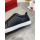 Close-up of side ventilation eyelets and pebbled leather texture on Christian Louboutin Rantulow black trainer