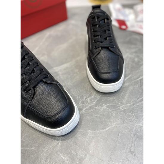 Close-up of toe box stitching and textured grain leather on Christian Louboutin Rantulow black trainers