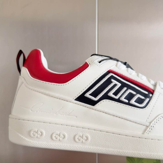 Close-up side view showing graphic panel on Gucci White Leather Low-Top Trainers With Red Trim