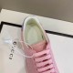 Gucci Pink Leather Trainer Upper Detail and Laces in pink and purple Close-up top view of the lace-up closure and tongue on the Gucci pink leather trainer in pink and purple