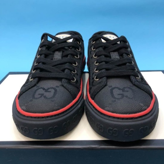 Gucci Off The Grid Black Low Top Trainers Front View in black and red Front view of both Gucci Off The Grid black trainers showing laces and toe caps in black and red