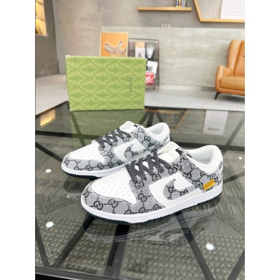Gucci Jacquard Pattern Trainers Side Profile in white and black Side profile view of Gucci white and black jacquard pattern trainers