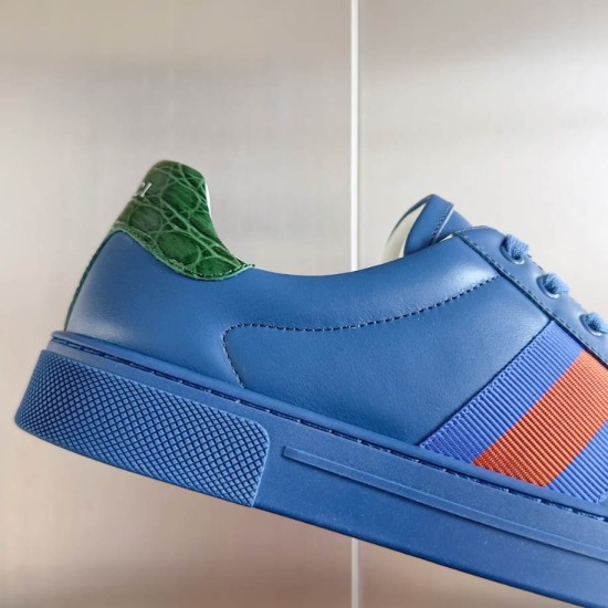 Gucci Ace Blue Leather Upper Close-Up Detail in blue and green Close-up of Gucci Ace blue leather upper showing stitch detailing, green heel counter, and side webbing