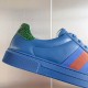 Gucci Ace Blue Leather Upper Close-Up Detail in blue and green Close-up of Gucci Ace blue leather upper showing stitch detailing, green heel counter, and side webbing