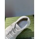 Top-down view inside off-white leather trainer showing branded insole