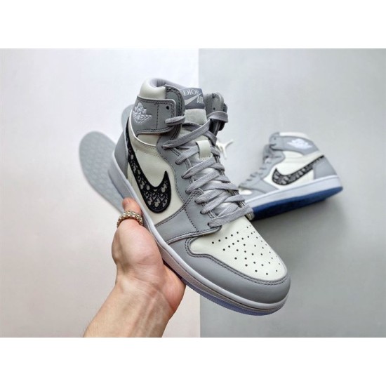 Three-quarter front view of Dior High Top Trainers Grey And White Leather
