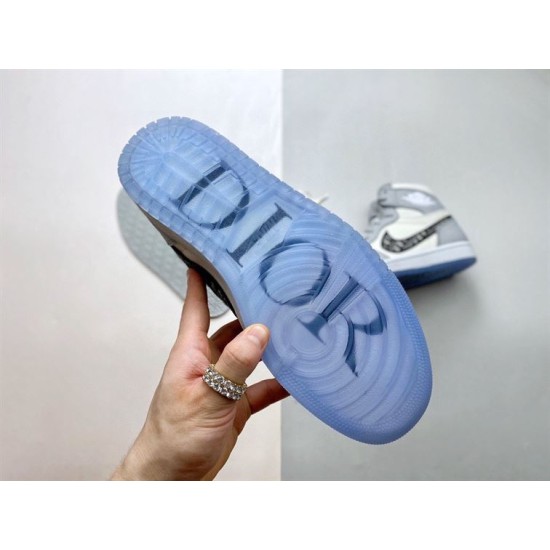 Close-up view of translucent blue outsole on Dior High Top Trainers Grey And White Leather