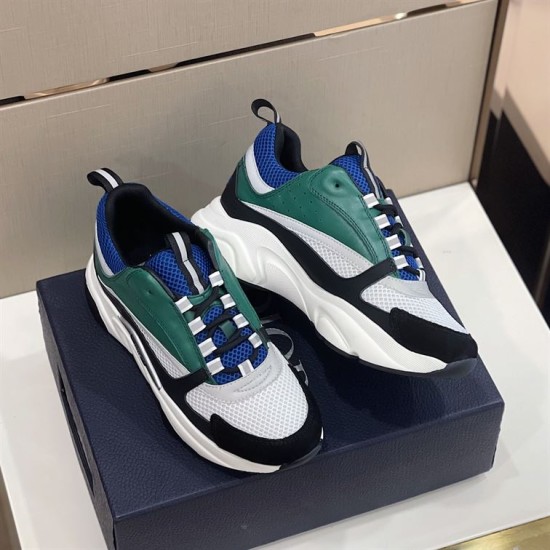 Dior B22 Blue Green Trainer Pair Angled Front View Angled top-front view of Dior B22 blue deep green trainers on box