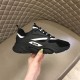 Dior B22 Technical Mesh And Leather Black Trainers Outer Side Outer side view of Dior B22 Trainer with sculpted black sole