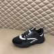 Dior B22 Technical Mesh And Leather Black Trainers Angled View Three-quarter angled view of black Dior B22 trainer with white accents