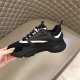 Dior B22 Technical Mesh And Leather Black Trainers Side Detail Side profile of black Dior B22 Trainer showing white accent stripes