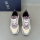 Top-down view of pair of Dior B22 grey and purple trainers