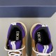 Dior B22 Inner Lining and Insole Detail in brown and purple Close-up top view of Dior B22 purple mesh collars and branded insoles in brown and purple