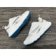 Dior B22 Off-White Trainers Outer Profile in off-white and blue Dior B22 off-white trainers displaying side logo insert in off-white and blue
